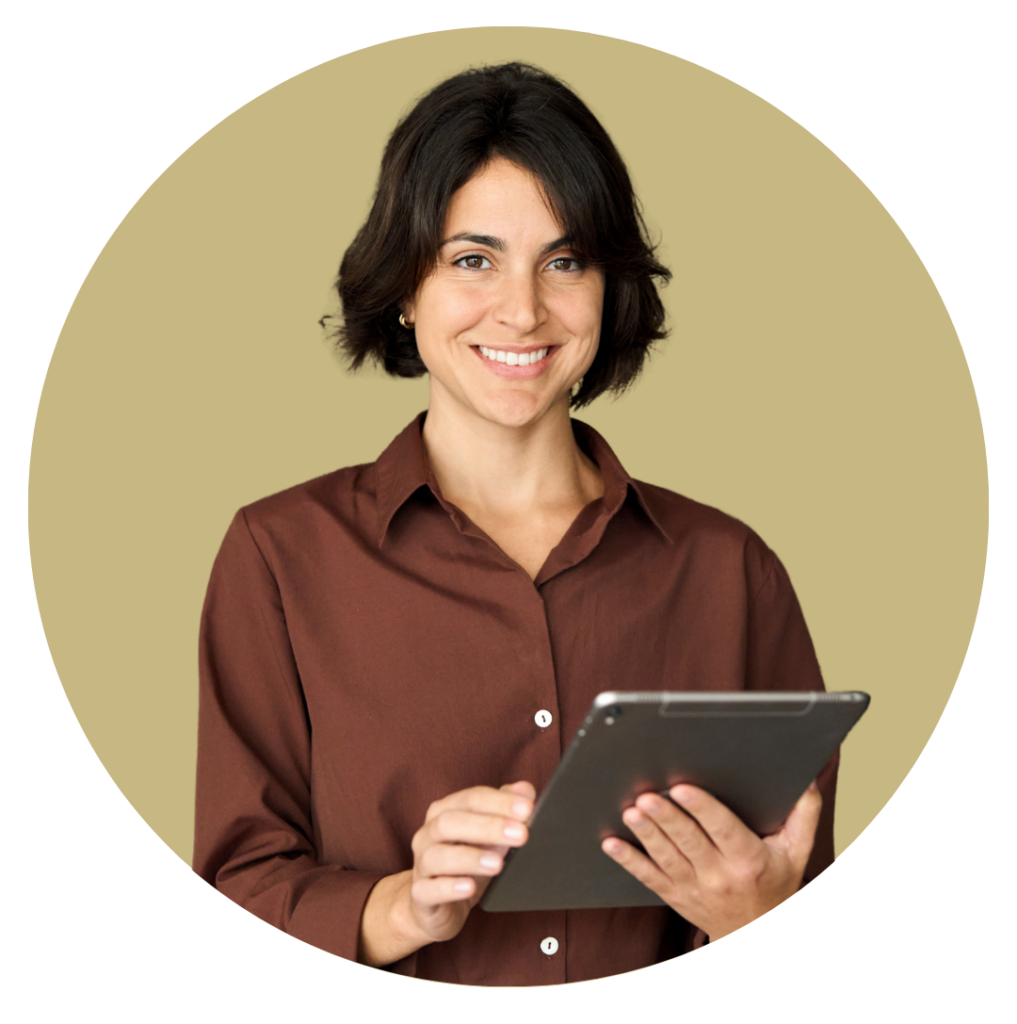 Smiling woman in a brown shirt holding a tablet toward the camera against a beige circular backdrop